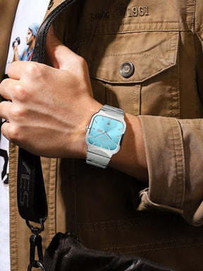 Relógio Quadrado Azul Claro Pulseira Malha Prata Data